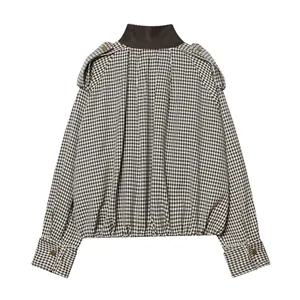 Detailed back view of a vintage checkered bomber jacket featuring a dark brown stand collar