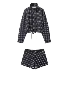Elegant black and white polka dot jacket with drawstring and matching mini shorts set