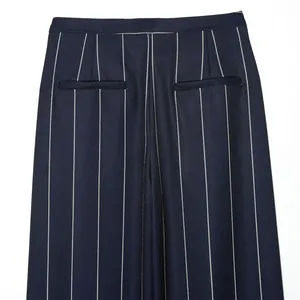 Detailed back view of navy pinstripe trousers showing waistband and welt pockets.