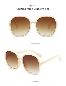 Retro oversized sunglasses for women with beige frame and tea gradient lenses