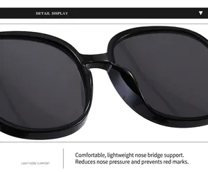 Detailed close-up view of lightweight integrated nose pads on black oversized vintage sunglasses