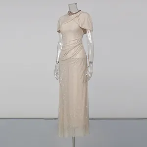 Elegant champagne rhinestone maxi dress featuring a chic cape sleeve and slim fit design