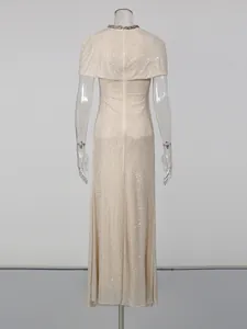 Elegant champagne sequin long dress featuring capelet sleeves and a slim fit design