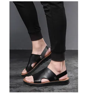 Stylish black breathable PU leather men's sandals with hollow design and back strap for summer.