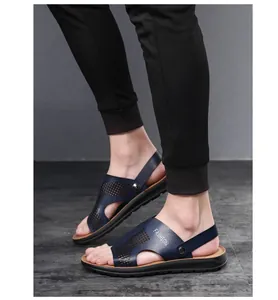 Close-up detail of men's stylish blue breathable PU leather sandals for summer beach wear