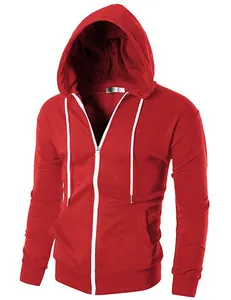 Macro view of red men's casual zip-up hoodie featuring white drawstrings and hood