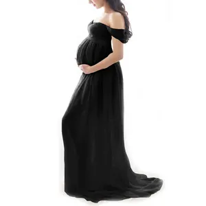 Elegant black off-shoulder maternity maxi dress for professional photography shoot