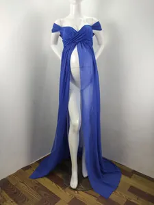 Detail view of blue off-shoulder maternity photography gown with lace and split front