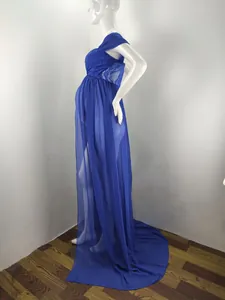 Side view of royal blue maternity dress with lace top and floor-length chiffon skirt
