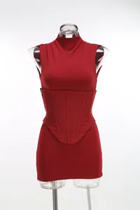Detailed view of a sexy burgundy two-piece mini dress featuring a matching corset belt
