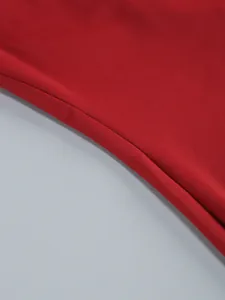Close-up detail of high-quality red fabric and durable seam on bodycon banquet dress
