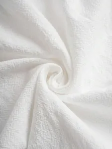 Vue macro détaillée d'un tissu en coton et lin blanc avec une texture de tissage précise