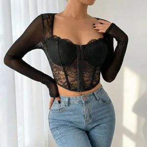Elegant black lace mesh corset top with square neck and sheer long sleeves detail view.