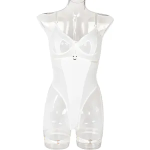 Detailed view of white mesh lingerie bodysuit with garter rings and underwire