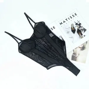 Flat lay of a sexy black sheer mesh bodysuit with spaghetti straps on a white background