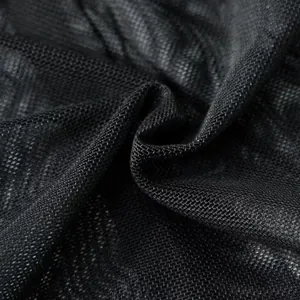 Close-up detail of black breathable mesh fabric texture for sexy women bodysuit