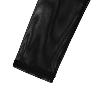 Close-up detail of sexy black sheer mesh long sleeve cuff with fine textile texture