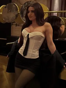 White strapless corset top with black tie detail and underwire fishbone structure