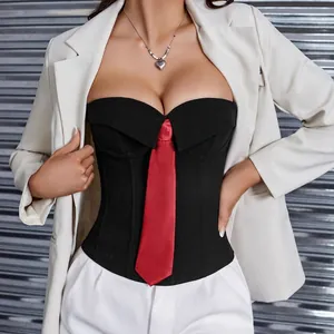 Close-up detail of black strapless corset top featuring a red tie and underwire boning
