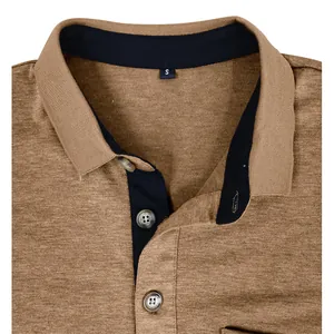 Detailed view of camel moisture-wicking polo shirt collar with navy contrast accents