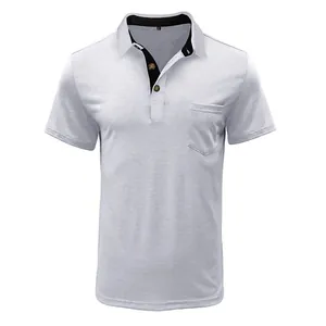Detailed view of white short-sleeved polo shirt featuring black contrast collar and pocket