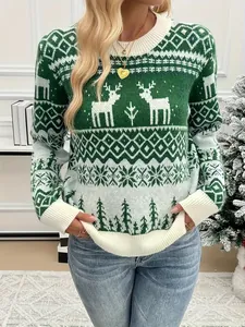Festive women's green Christmas sweater featuring reindeer and snowflake knit patterns.