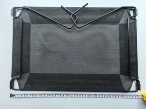 Close-up detail of a breathable black mesh cat hammock shown with a measurement tape