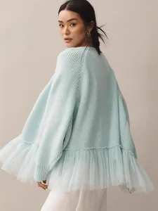 Elegant light blue long sleeve knit sweater featuring a multi-layered tulle ruffle hem.