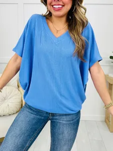 Casual blue V-neck short sleeve top with a detailed ribbed knit texture