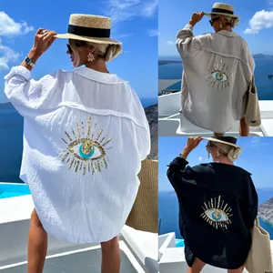 Camicia da spiaggia oversize da donna con ricamo evil eye in paillettes sul retro