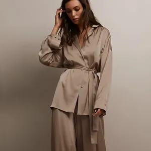 Elegant champagne silk-like two-piece pajama set with belted robe and long pants