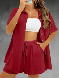 Close-up of deep red linen-style casual shirt and shorts set for women