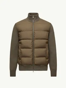 Professional detailed view of men's olive green knit sleeve hybrid puffer jacket