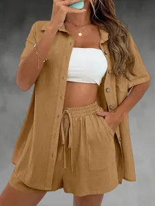 Detail view of a chic camel summer two-piece set with a shirt and matching shorts.