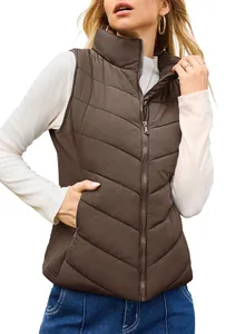 Close-up of a women's brown quilted puffer vest featuring a stand-collar design