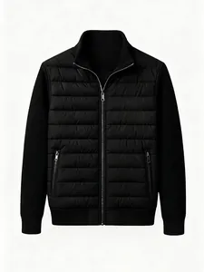 Detailansicht einer schwarzen Herren-Hybridjacke mit Steppfront und Rippstrickärmeln