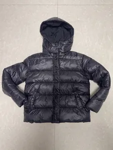 Classic black men's American style hooded puffer jacket with quilted design for winter warmth