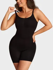 Close-up detail of black seamless tummy control shapewear bodysuit with wide straps