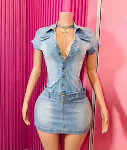 Detail of slim fit light blue denim short sleeve dress with front button closure