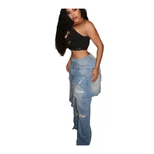 Detail of light blue straight-leg jeans with unique apron overlay and distressed rips