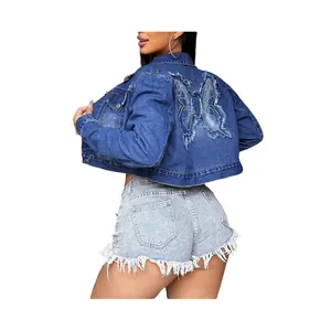 Detail showing the butterfly embroidery and frayed denim on the back of the jacket.