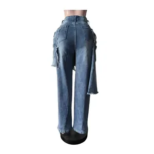 Back view of stylish blue denim jeans featuring a unique distressed apron layer detail.