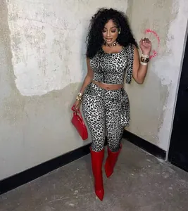 Two-piece leopard print set featuring a crop top and matching high-waist leggings