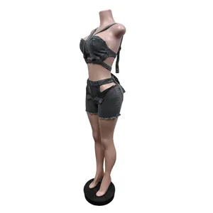 Side view of grey denim crop top and cutout shorts set on a mannequin