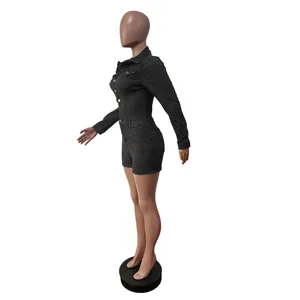 Detailed side view of a slim-fit black long-sleeve elastic denim romper on a mannequin.