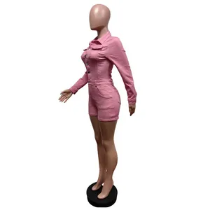 Side profile of a trendy pink long-sleeved elastic denim romper on a mannequin