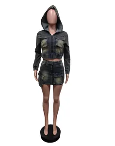 Front view of two-piece elastic denim set featuring hooded jacket and mini skirt on mannequin.