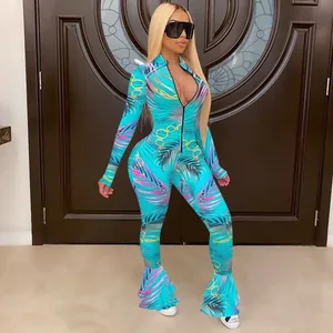 Slim fit tropical print jumpsuit with front zipper and flared mermaid hem legs