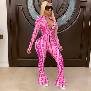 Full-length pink tie-dye long sleeve jumpsuit featuring a slim fit and flared fishtail hem
