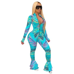 Full body view of a slim fit tropical print jumpsuit with flared fishtail hem detail